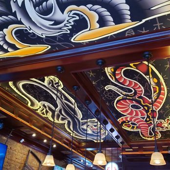 Drink and Ink - a mural of a dragon on the ceiling - Pubs Near Me - Chicago, Illinois