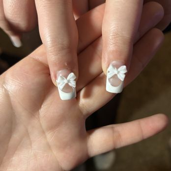 T Spa Nails - Bows positioned CROOKED AND UNEVEN. - Nail Salons Near Me - Olympia, Washington T Spa Nails - Bows positioned CROOKED AND UNEVEN. - Nail Salons Near Me - Olympia, Washington