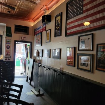 Shillelagh Tavern - american flags on the wall - Sports Bars Near Me - Astoria, New York