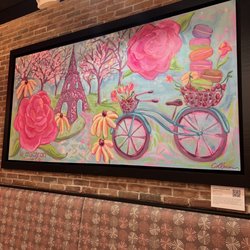 Le Macaron French Pastries - Beautiful Traverse City artist photo in front of large sitting area