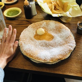 Superica - Hot cakes - hand for size reference - Tex-Mex Near Me - Houston, Texas