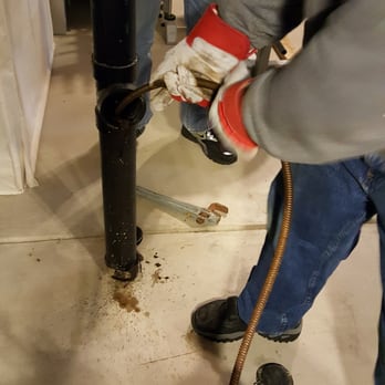 Jimmy Rooter - Jimmy pushing and rotating snake pipe to "cut up" or push thru the blockage. - Plumbing Near Me Jimmy Rooter - Jimmy pushing and rotating snake pipe to "cut up" or push thru the blockage. - Plumbing Near Me
