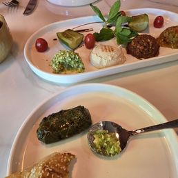 Mix Mezze Plate and complimentary bread Mix Mezze Plate and complimentary bread