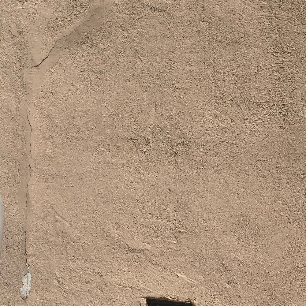 Carver's Plastering - (Before) Fireplace shifting - Stucco Services Near Me
