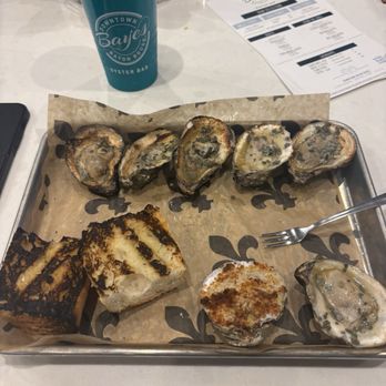 Bayes Oyster Bar - Bbq Nola style oysters with one bacon/brie - Bars Near Me - Baton Rouge, Louisiana Bayes Oyster Bar - Bbq Nola style oysters with one bacon/brie - Bars Near Me - Baton Rouge, Louisiana