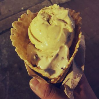 The Charmery Hampden - Pistachio Toffee and Malty Vanilla Chip in a waffle cone. - Ice Cream & Frozen Yogurt Near Me - Baltimore, Maryland The Charmery Hampden - Pistachio Toffee and Malty Vanilla Chip in a waffle cone. - Ice Cream & Frozen Yogurt Near Me - Baltimore, Maryland
