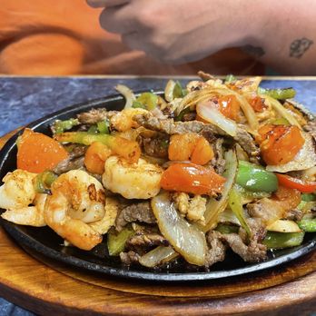 Manantial Mexican Grill - My partner got the Texas fajitas - Mexican Near Me - Cherryville, North Carolina Manantial Mexican Grill - My partner got the Texas fajitas - Mexican Near Me - Cherryville, North Carolina