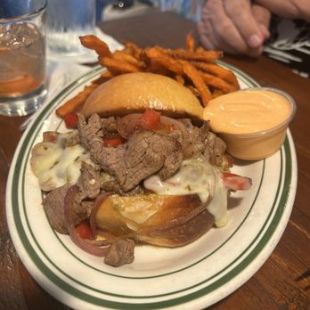 Summer House - Hanger Steak sandwich with sweet potato fries. - New American Near Me - Corona Del Mar, California Summer House - Hanger Steak sandwich with sweet potato fries. - New American Near Me - Corona Del Mar, California