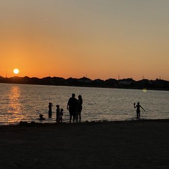 Lake Pflugerville - People enjoying man made beach. - Parks Near Me - Pflugerville, Texas