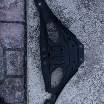Tuned Autoworks - Rack and pinion cover with the square cut into it on the bottom side. - Auto Repair Near Me - Miami, Florida