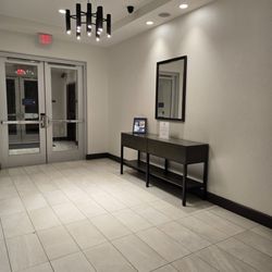 Hyatt Place Flint / Grand Blanc - Elevator hallway on main floor and back entrance