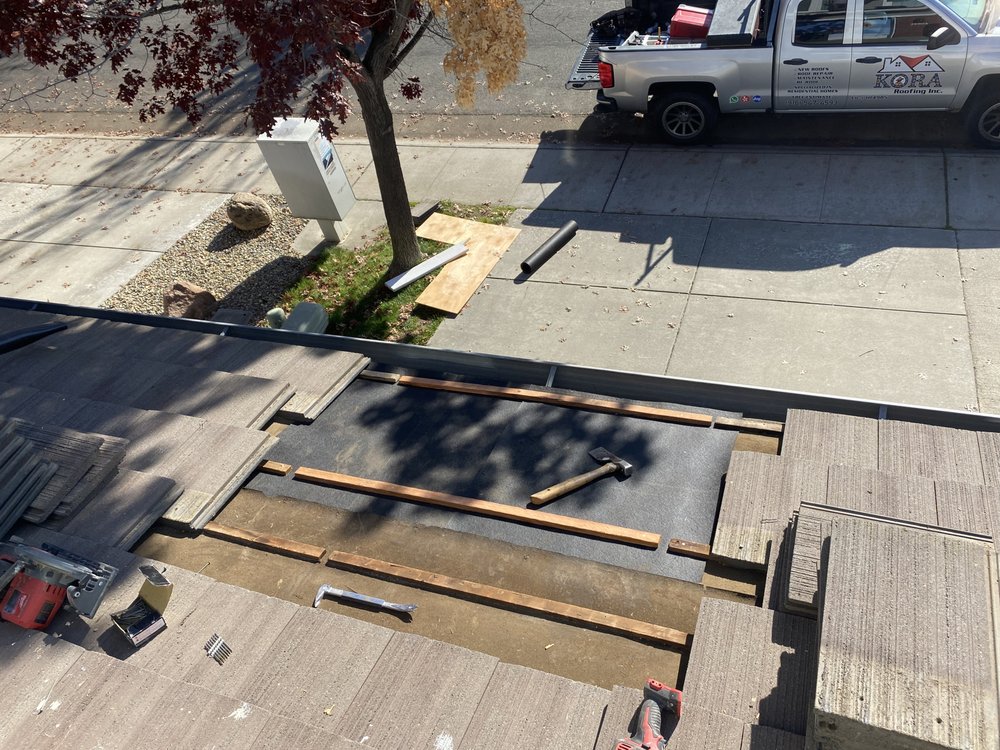 Slide of Kora Roofing