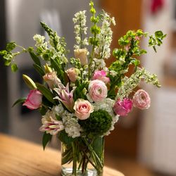Fresh seasonal flowers designed with natural texture and elegant style. Local florist serving Sebastian and nearby areas.