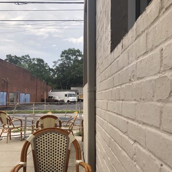 Fire Stone Wood Fired Grill - Outdoor Patio (2 tables are under an awning) - Pizza Near Me - Dothan, Alabama Fire Stone Wood Fired Grill - Outdoor Patio (2 tables are under an awning) - Pizza Near Me - Dothan, Alabama