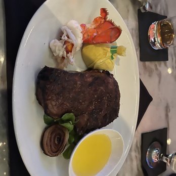 Rococo Steak - Ribeye 16 oz with 1/2 Half Lobster Tail - Steakhouses Near Me - St. Petersburg, Florida Rococo Steak - Ribeye 16 oz with 1/2 Half Lobster Tail - Steakhouses Near Me - St. Petersburg, Florida