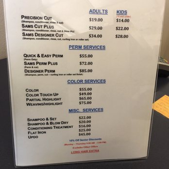 Fantastic Sams - Sign says for longer hair w/o an indication of what is considered longer hair or what the charge is. - Hair Salons Near Me - Orange, California Fantastic Sams - Sign says for longer hair w/o an indication of what is considered longer hair or what the charge is. - Hair Salons Near Me - Orange, California