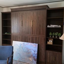 Murphy bed and cabinet in walnut. Requires considerable expertise to install. Murphy bed and cabinet in walnut. Requires considerable expertise to install.