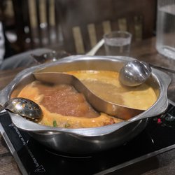 Ibasaw - Half tomato broth and Tom yum broth