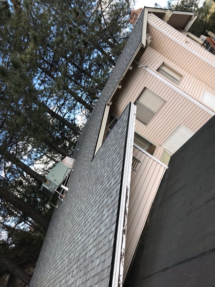 Slide of JMK Roofing