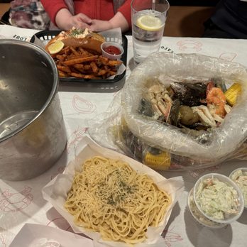 Cap't Loui - In the bag: snow crab, mussels, shrimp, calamari, sausages
Sides: garlic noodles and cole slaw - Cajun/Creole Near Me - Fort Lee, New Jersey Cap't Loui - In the bag: snow crab, mussels, shrimp, calamari, sausages
Sides: garlic noodles and cole slaw - Cajun/Creole Near Me - Fort Lee, New Jersey