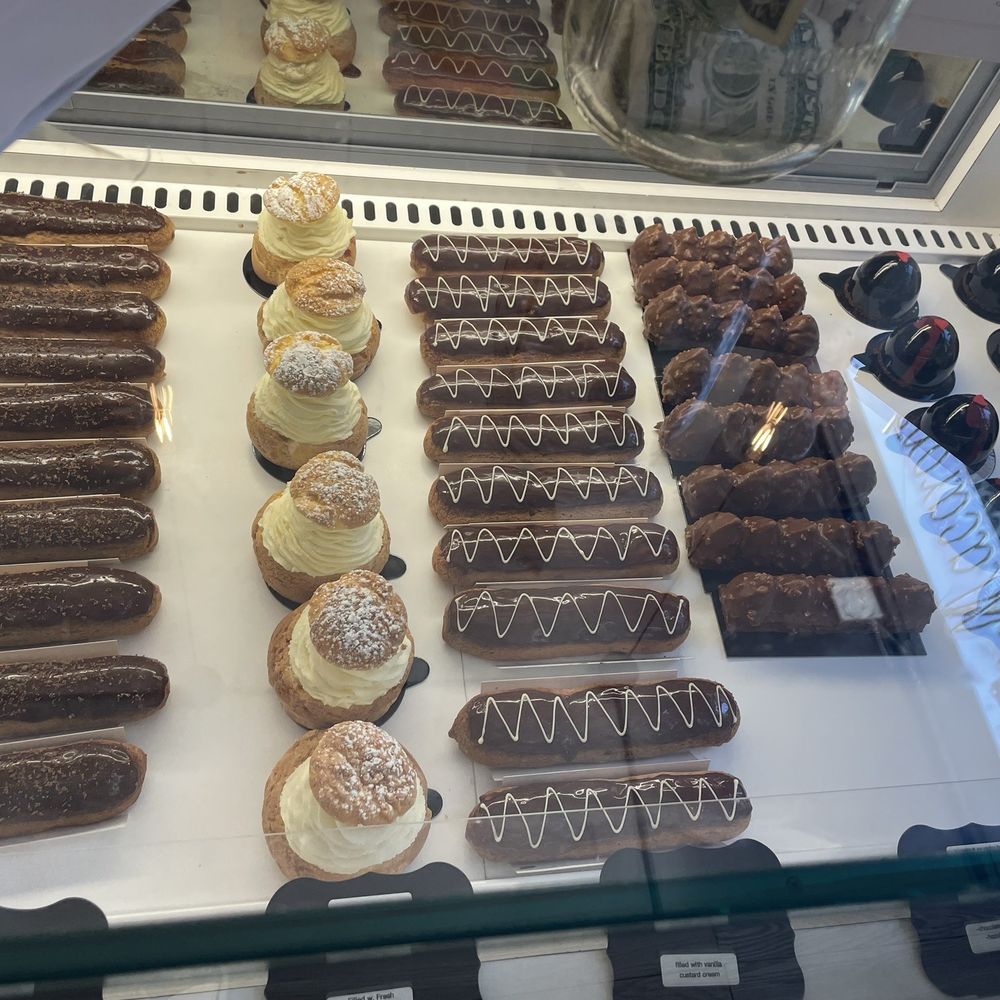 Delice Macarons - Chocolate eclairs filled with both chocolate and plain pastry cream.  French cream puffs and hazelnut chocolate dream. And so much more. - Macarons Near Me - New York, New York