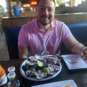 The Fish House - Oysters on the half shell and Fried Calamari - Seafood Near Me - Miami, Florida The Fish House - Oysters on the half shell and Fried Calamari - Seafood Near Me - Miami, Florida