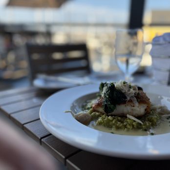 Carrol's Creek Cafe - a plate of food on a table - Seafood Near Me - Annapolis, Maryland Carrol's Creek Cafe - a plate of food on a table - Seafood Near Me - Annapolis, Maryland
