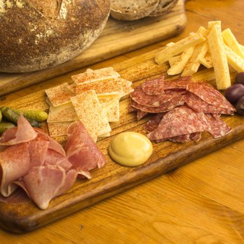 Paprika - The signature Paprika platter with salami , prosciutto , gourmet cheeses , and a sprinkle of imported paprika at Paprika SF - Czech Near Me - San Francisco, California