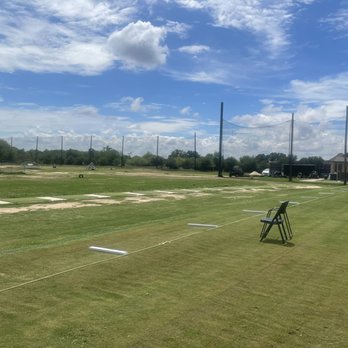 Aggieland Driving Range - Both grass and turf matted tee boxes, and targets (greens with flags, netted trampolines, variety of tire targets, and barrels). - Golf Near Me - College Station, Texas Aggieland Driving Range - Both grass and turf matted tee boxes, and targets (greens with flags, netted trampolines, variety of tire targets, and barrels). - Golf Near Me - College Station, Texas