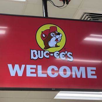 Buc-ee’s - Signage - A digital screen shows the Buc-ee's logo with a cartoon beaver and the word 'WELCOME' in large letters. - Gas Stations Near Me - Saint Augustine, Florida