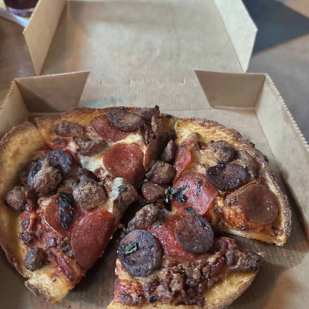 Old Chicago Pizza + Taproom - A Burnt Personal Pizza to go - Pizza Near Me - Columbia, South Carolina Old Chicago Pizza + Taproom - A Burnt Personal Pizza to go - Pizza Near Me - Columbia, South Carolina