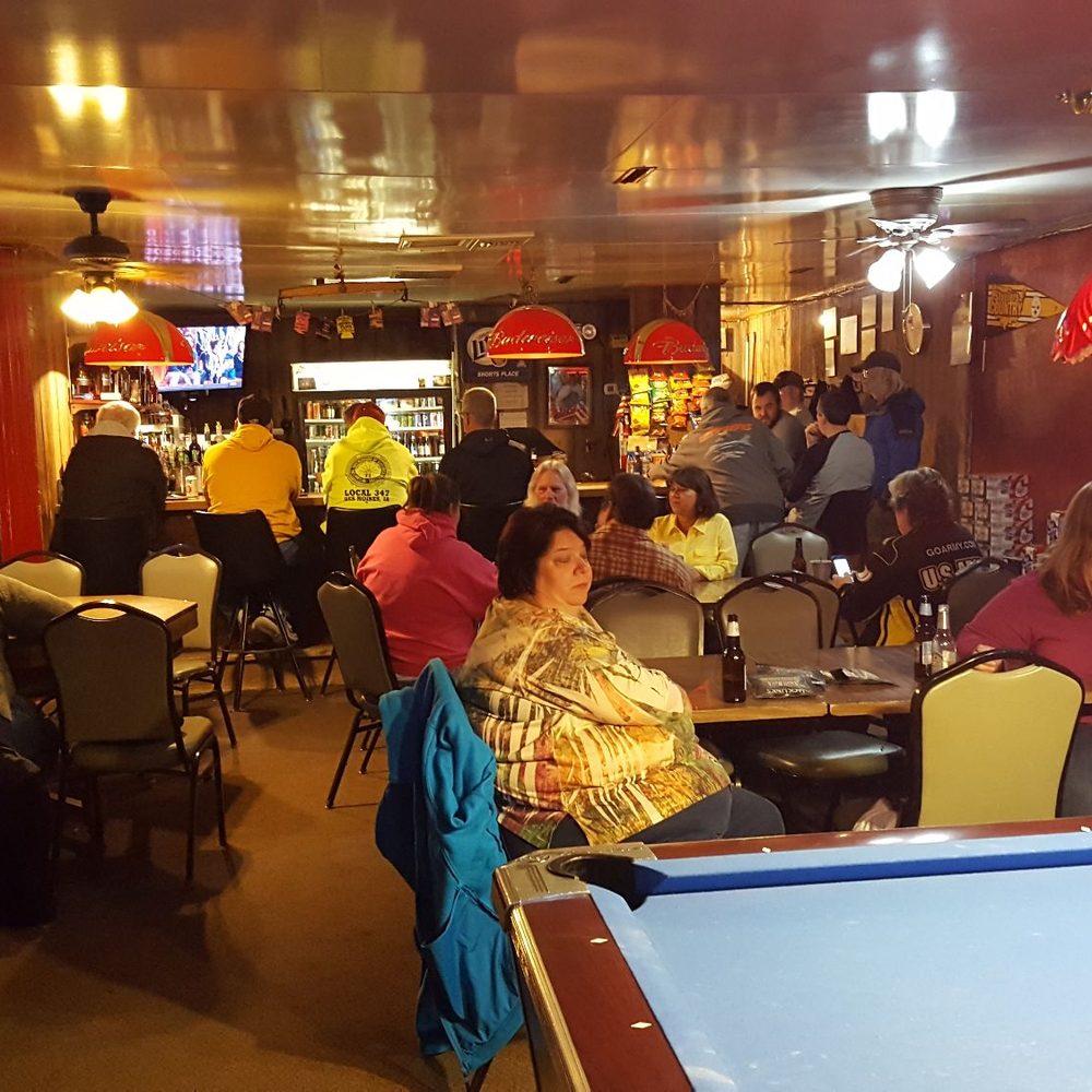 Short's Place - a pool table with a pool ball on it - Bars Near Me - Menlo, Iowa