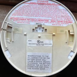 Eighteen year old smoke detector from condo building hallway that McGill manages.