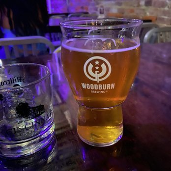 Woodburn Brewing - a glass of beer and a shot of water - Breweries Near Me - Cincinnati, Ohio Woodburn Brewing - a glass of beer and a shot of water - Breweries Near Me - Cincinnati, Ohio