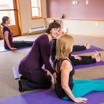 Breathe and Be Well - Helping my student create length in the low back. - Yoga Near Me - Denver, Colorado Breathe and Be Well - Helping my student create length in the low back. - Yoga Near Me - Denver, Colorado