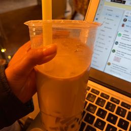Black tea with brown sugar and lavender milk tea with tapioca and lychee popping Black tea with brown sugar and lavender milk tea with tapioca and lychee popping
