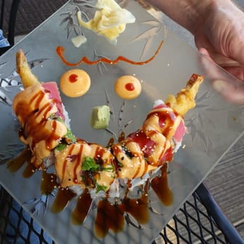 QQ Sushi & Kitchen - Red Dragon Roll. A little too much sauce for my taste, but easily remedied by taking it off with a fork or chopsticks. - Sushi Bars Near Me - Spokane, Washington QQ Sushi & Kitchen - Red Dragon Roll. A little too much sauce for my taste, but easily remedied by taking it off with a fork or chopsticks. - Sushi Bars Near Me - Spokane, Washington