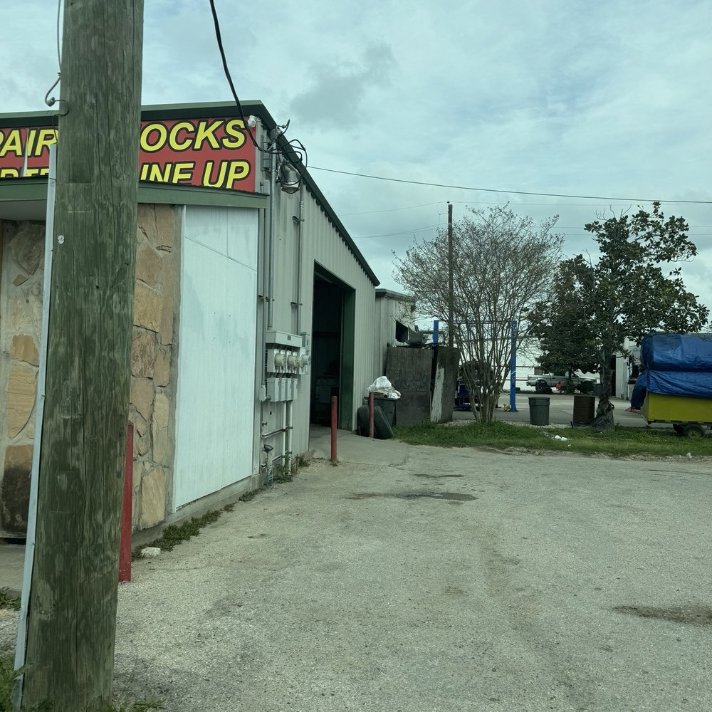 Reyes Auto Electric - Garage entrance on side of building - Auto Repair Near Me - Katy, Texas Reyes Auto Electric - Garage entrance on side of building - Auto Repair Near Me - Katy, Texas