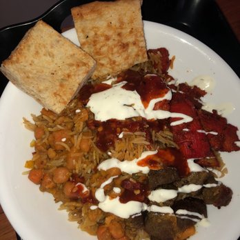 Big Red Halal - half of my combo platter (w all of the provided white sauce) along w chickpeas and potato qorma - Afghan Near Me - Springfield, Virginia