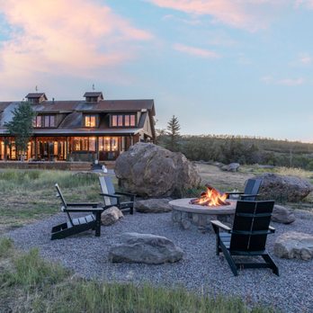 Elevate Scapes and Stone - Elegant STONE VENEER FIREPLACE with stunning rock placements--bringing warmth, beauty, and timeless craftsmanship to your space! - Landscaping Near Me - Edwards, Colorado