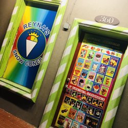 Reyna's Snow Cones - Menu items and business name.