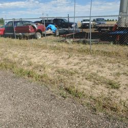 Elizabeth Towing & Recovery Services - Sitting outside this gate all morning waiting for the guy I talked to on the phone.
Not very well marked no one here to accept payment.