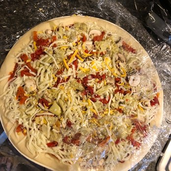 Papa Murphy's - a pizza on a table - Pizza Near Me - Albuquerque, New Mexico Papa Murphy's - a pizza on a table - Pizza Near Me - Albuquerque, New Mexico