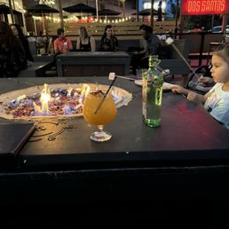 Fire pit with our water, drinks, and a s'mores kit for the kids. Fire pit with our water, drinks, and a s'mores kit for the kids.