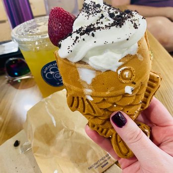 Hanamaru Cafe - Iced green tea with vanilla ice cream, strawberry and Oreo crumbs on top. It melts fast but so good to cool off with. - Japanese Near Me - San Antonio, Texas