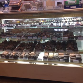 Rocky Mountain Chocolate - a display case full of chocolates - Candy Stores Near Me - Littleton, Colorado Rocky Mountain Chocolate - a display case full of chocolates - Candy Stores Near Me - Littleton, Colorado