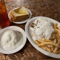 Texas Traditions - Texas toast, mashed potatoes, chicken fried steak, french fries, and a sweet tea