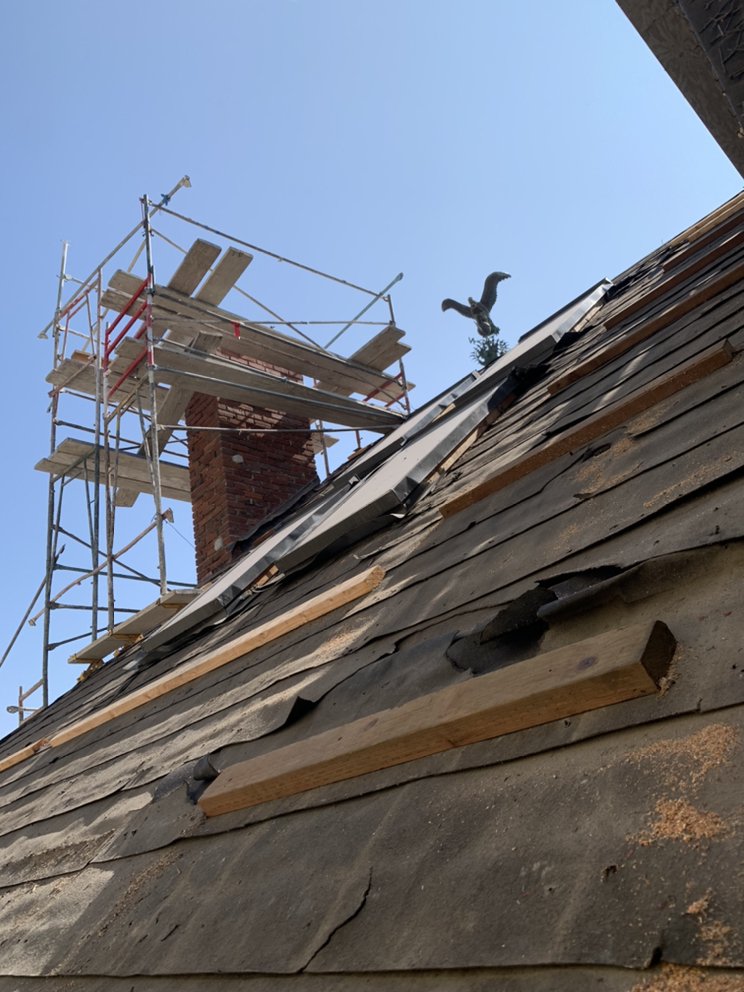 Slide of Juvens Roofing