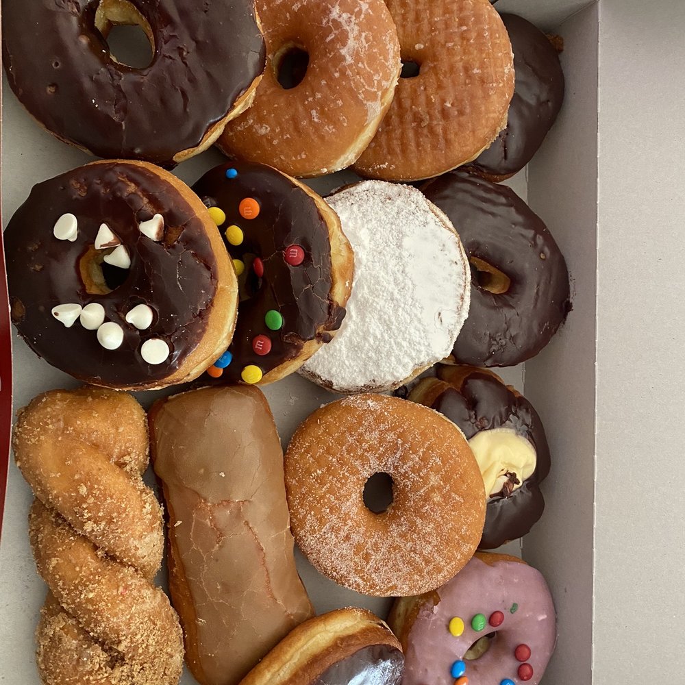 a variety of donuts in a box