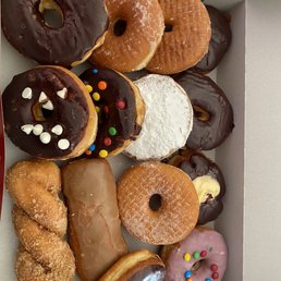 a variety of donuts in a box
